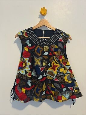 Sleeveless Embroidered Flare Top